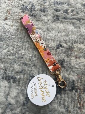 Elyse Breanne Floral Wristlet Keychain in Rainbow Garden Pattern